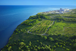 An aerial view of the Darlington Nuclear Generating Station from a distance