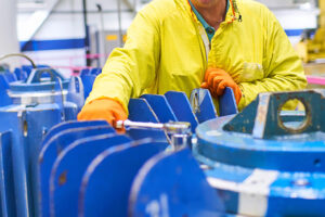 A worker harvesting medical isotopes.