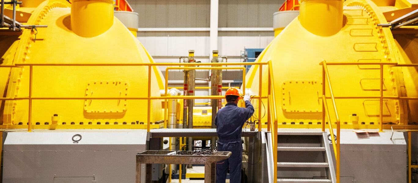 A worker at Pickering Nuclear working on a turbine
