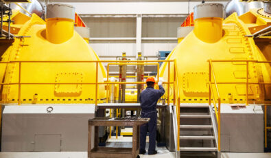A worker at Pickering Nuclear working on a turbine